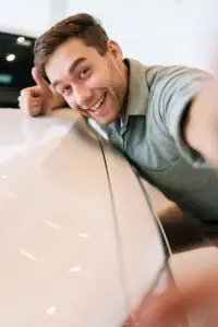 happy man with a car